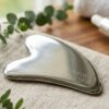gua sha acero inoxidable