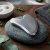 gua sha de acero inoxidable para el rostro