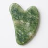 piedra gua sha de jade rostro