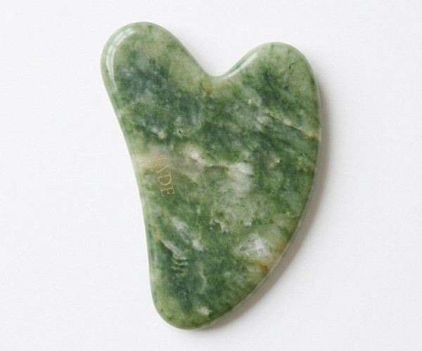 piedra gua sha de jade rostro
